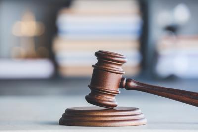 Judge's gavel on table in office