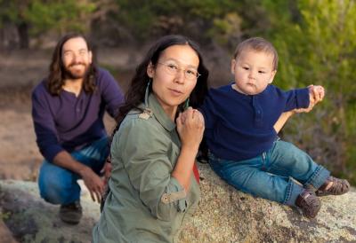 Native American woman outdoors with child