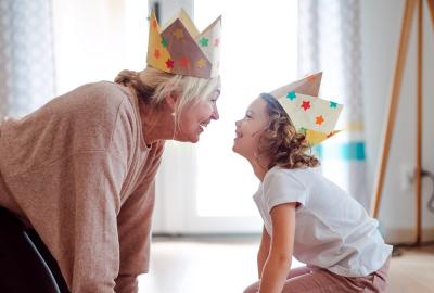 Grandmother and granddaughter playing