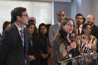 Governor Bob Ferguson and DCYF Secretary at speaking event.