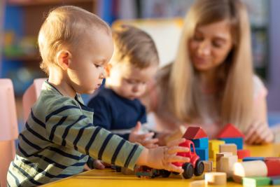 Toddlers playing with blocks