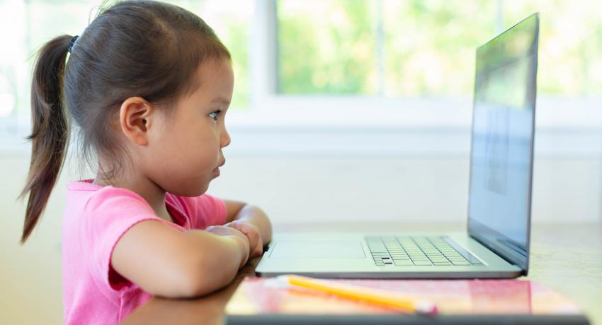 little girl on laptop