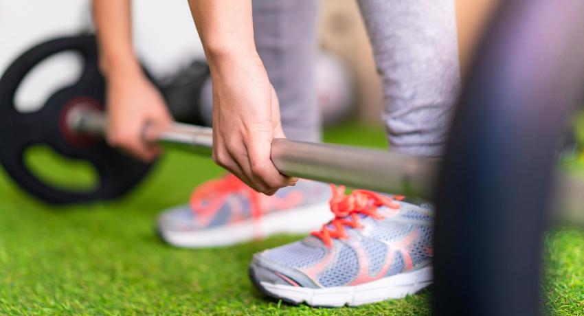 A person lifting weights. 