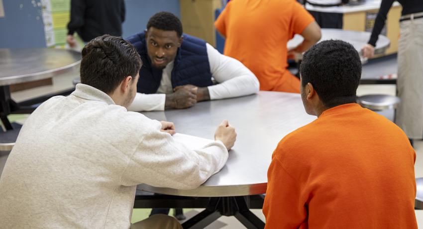 Young people talking with DK Metcalf